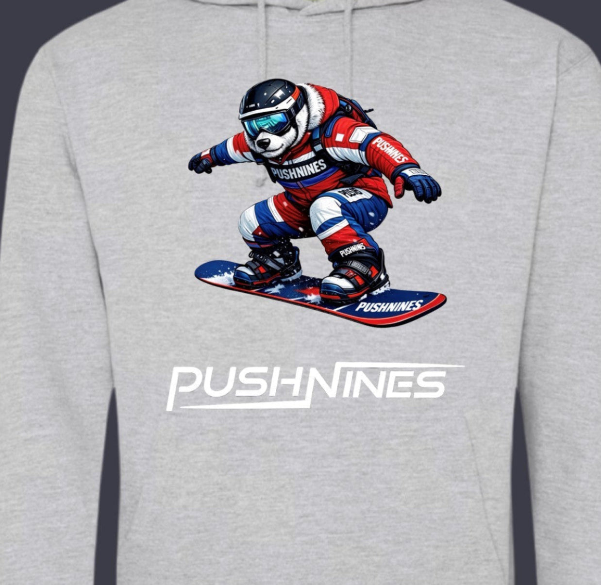 Gray hoodie with a graphic of a snowboarder and 'PushNines' branding on a dark background